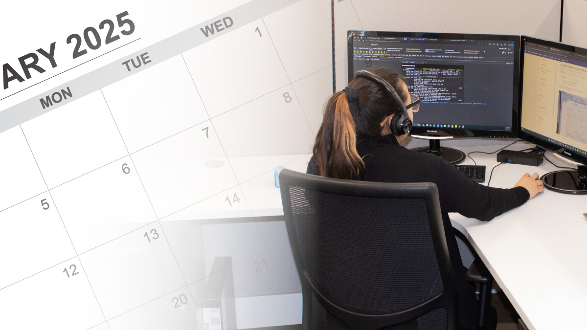 A person servicing loans and a 2025 calendar